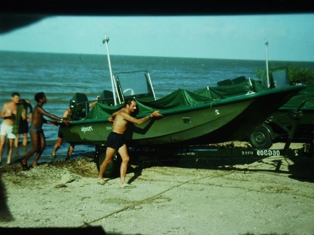 Sgt. O'Creagh ACC helps with landing craft Belize 1976